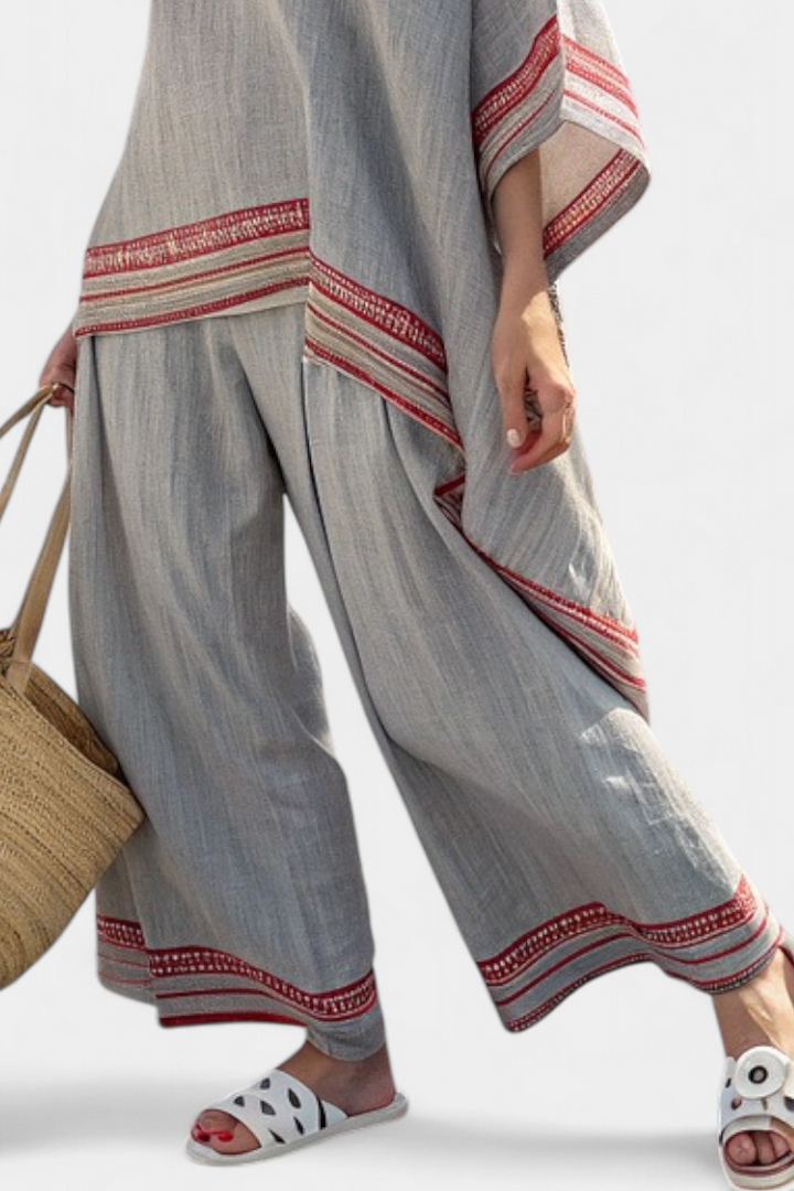 Rossella – blusa asimétrica sofisticada y pantalones étnicos de pierna ancha