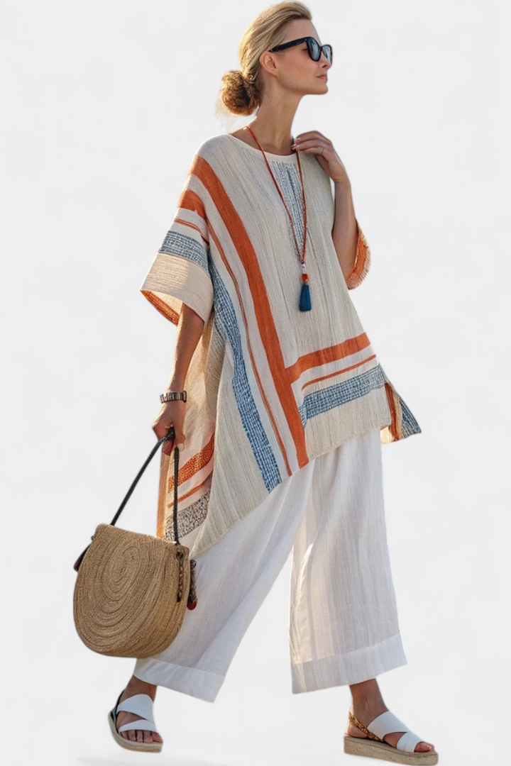 Loredana – blusa asimétrica sofisticada y pantalones de lino de pierna ancha