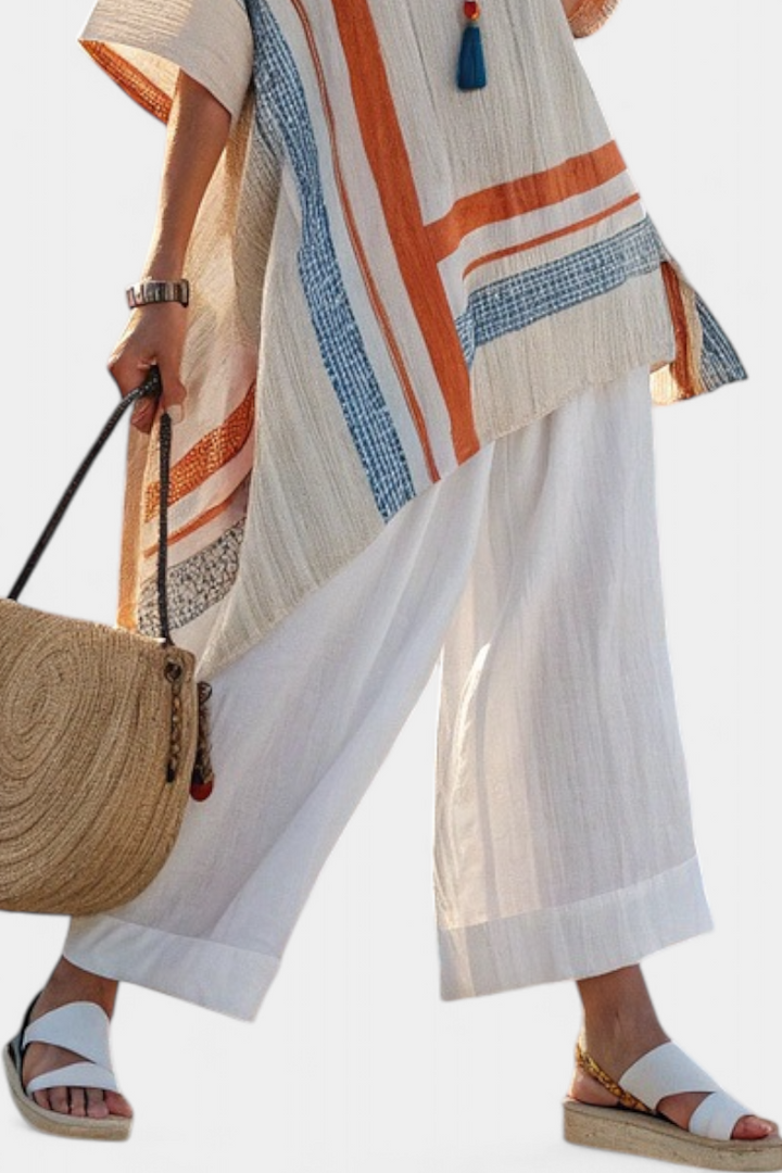 Loredana – blusa asimétrica sofisticada y pantalones de lino de pierna ancha