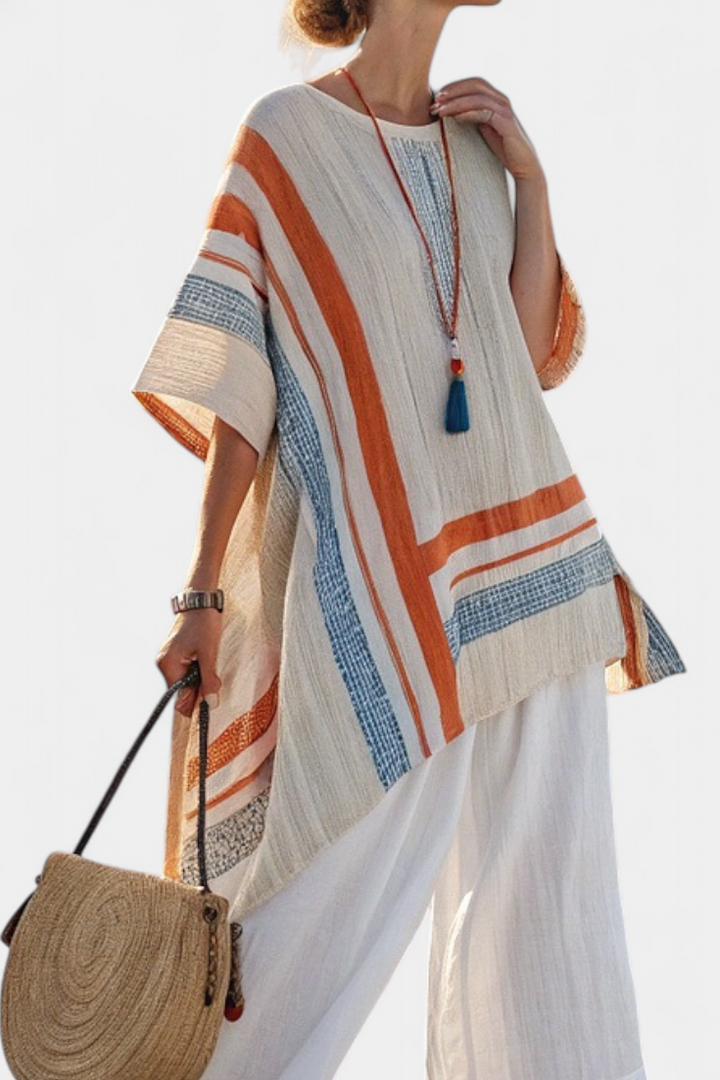 Loredana – blusa asimétrica sofisticada y pantalones de lino de pierna ancha